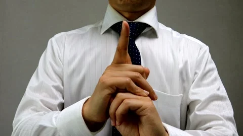A businessman disappears while striking a ninja pose. Stock Footage 335734936