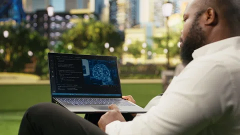 Businessman displaying source code and digital AI interface Stock Footage 343501229