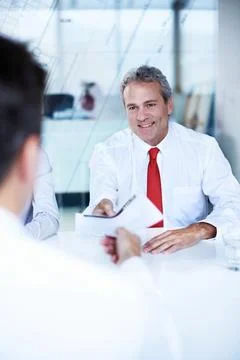 Businessman, document and interview for conversation, hiring process or hr .. Fotos de archivo