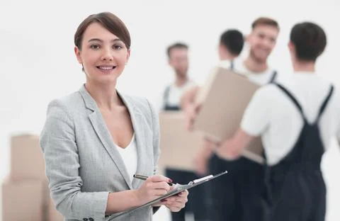 Businessman with documents, creating a stack of cardboard boxes. Foto stock