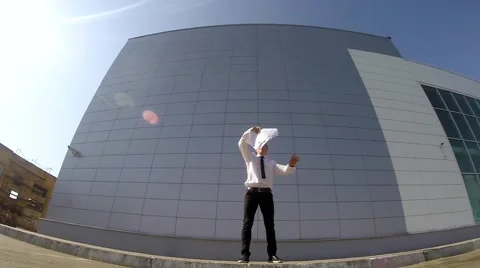 Businessman Doing flips and tricks. Jumping near wall. Stock Footage 67343512