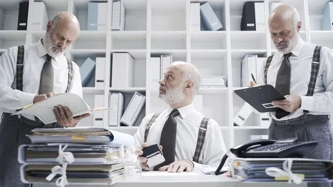 Businessman doing multiple tasks at the same time Video stock 99195371