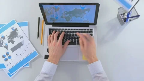 Businessman is doing things behind the workplace Stock-Footage 81486913