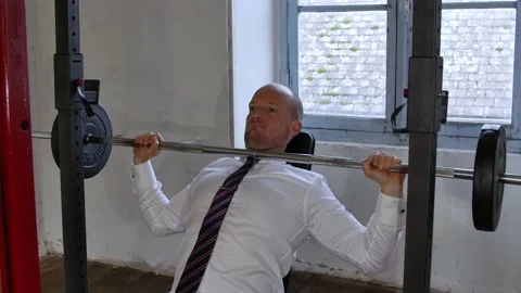 Businessman doing workout exercise. Concept of a happy active lifestyle. Stock Footage 143168298