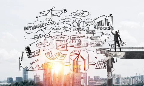 Businessman drawing business conceptual sketches. Stock Photos