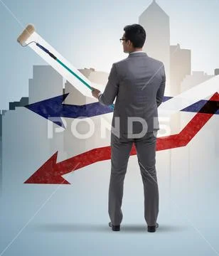 Businessman drawing charts in forecasting concept Stock Photos