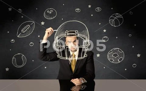 Businessman Drawing Helmet And Sport Balls