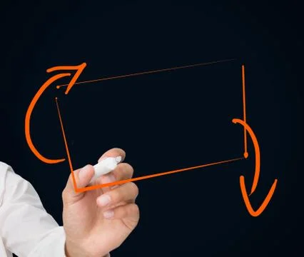 Businessman drawing orange rectangle Stock Photos