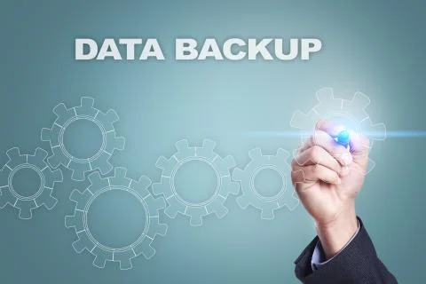 Businessman drawing on virtual screen. data backup concept. Stock Photos