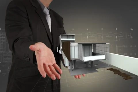 Businessman draws building development Ilustración de archivo