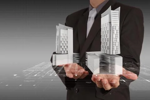 Businessman draws building development Stock Illustration