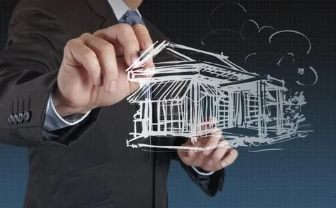Businessman draws building development Ilustración de archivo