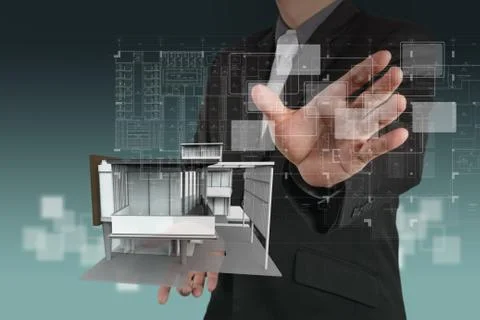 Businessman draws building development Ilustración de archivo