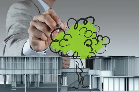 Businessman draws building development Ilustración de archivo