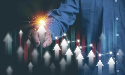 Businessman draws increase arrow of graph growth for analysis growth graph .. Stock Photos