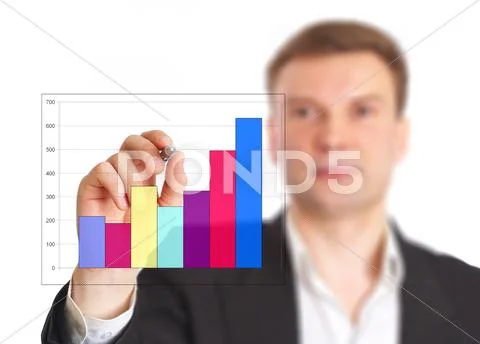 The businessman draws the schedule. Stock Photos