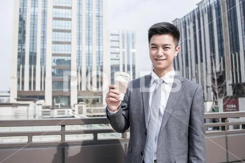 Businessman Drink Coffee At Outdoor