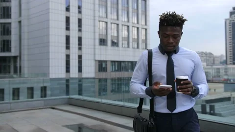 Businessman drinking coffee and checking phone Stock Footage 96125910