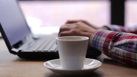 Businessman Drinking Coffee in a Cafe Video stock 63090349