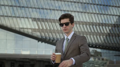 Businessman Drinking Coffee, Checking His Watch near Modern Office Stock Footage 342717734