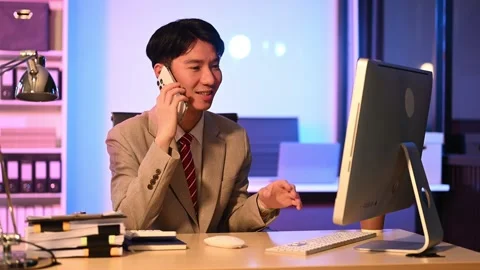 Businessman drinking coffee to get some energy for working overtime sitting.. Stock Footage 313577894