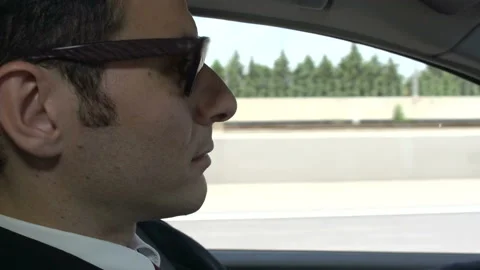 Businessman driving close up Video stock 210401284