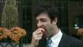 Businessman eats apple. HD Footage