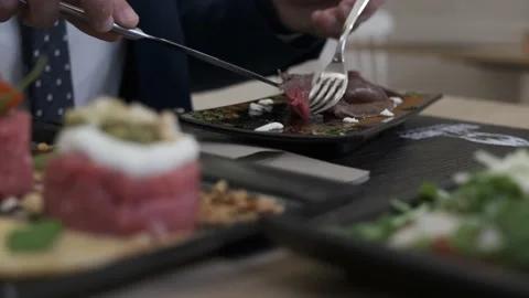 Businessman eats at the restaurant Stock Footage 205557545