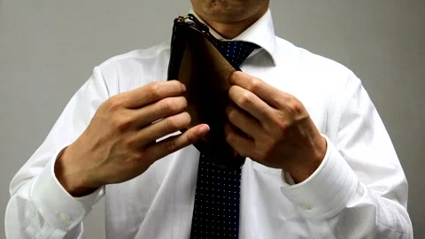 A businessman with an empty wallet Stock-Footage 335760483