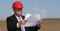 Businessman Examine Development Plan Wind Turbine Renewable Alternative Energy 4k or 4k+ Resolution