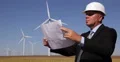 Businessman Examine Renewable Alternative Energy Sheets Wind Turbines Developer 4k or 4k+ Resolution