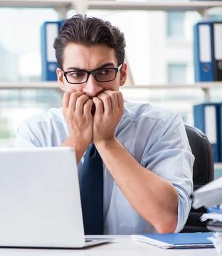 Businessman with excessive work paperwork working in office Stock Photos