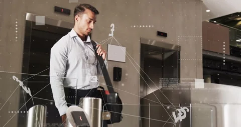Businessman exiting elevator, tapping pass on sensor, opening barrier with Stock Footage 314433163