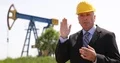 Businessman Explain Oil Extracting Petroleum Processing Petrochemical Method US 4k or 4k+ Resolution