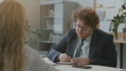 Businessman Explaining Ideas during Office Meeting with Colleague 스톡 동영상 331557308