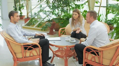 The businessman explains to the colleagues the plan of work Stock Footage 57458287