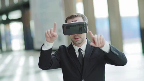Businessman exploring virtual reality Stock Footage 108682043