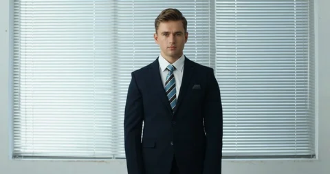 Businessman from expressionless expression to smile expression Stock Footage 100949397