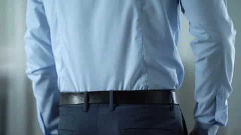 Businessman feeling lower back pain, nerves inflammation, kidneys disorder Stock Footage 93574860