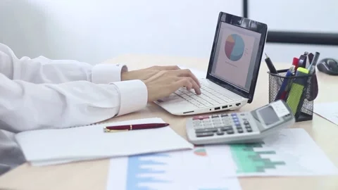 Businessman financier working in the office using a modern laptop Stock Footage 87085822