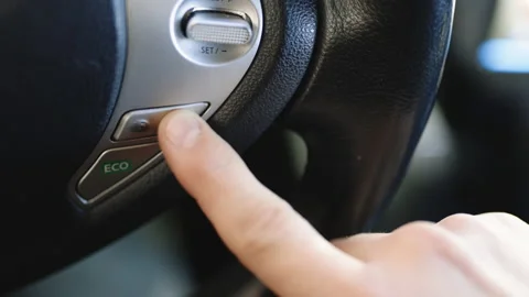 Businessman finger press the button to start the autonomous cruise control Video stock 196002820