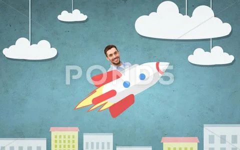 Businessman flying on rocket above cartoon city Stock Photos