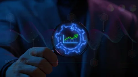 Businessman focus on virtual graph with up arrow inside cogwheel. Stock Footage 313372546