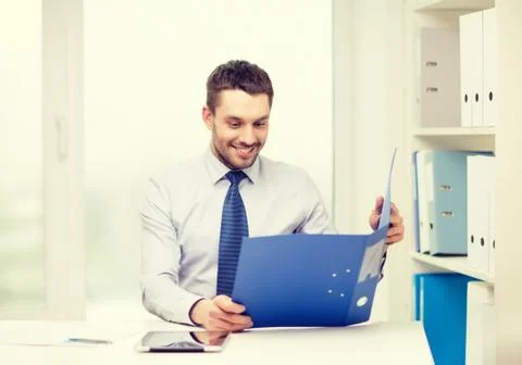 Businessman with folder and tablet pc computer 스톡 사진