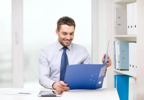 Businessman with folder and tablet pc computer Foto stock