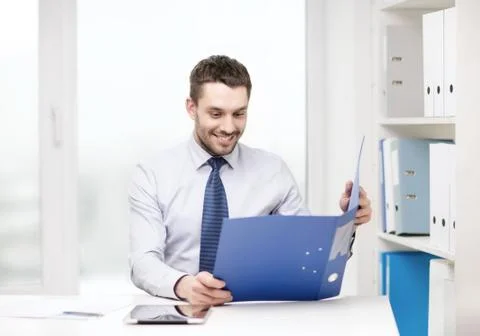 Businessman with folder and tablet pc computer 스톡 사진