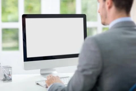 Businessman in front of computer イラスト素材