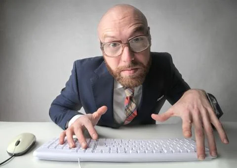 Businessman in front of computer Stock Photos