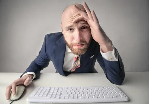 Businessman in front of computer Stock Photos