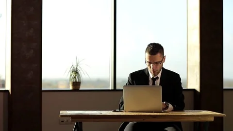 Businessman funny dancing in the office. Video stock 74773259